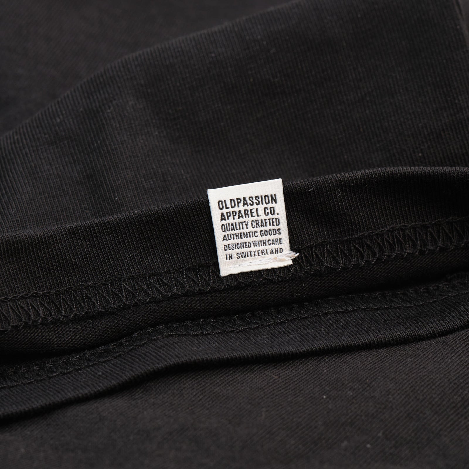 tee-t-shirt-oldpassion-apparel-co.-from-prison-with-love-schwarz-webetikette-label-saum-rueckseite